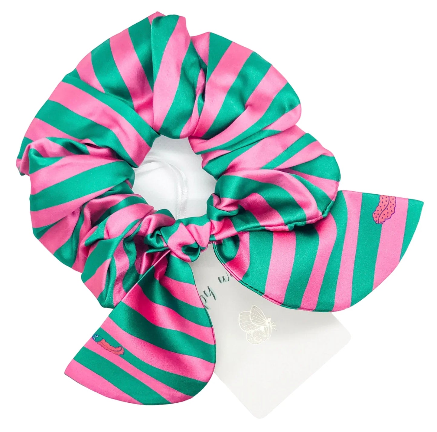 Close up of pink and green flamingo stripe silk hair tie