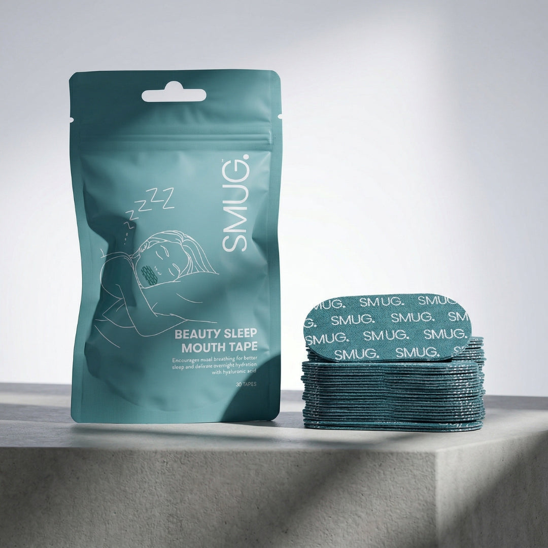 SMUG beauty sleep mouth tape packaging and product sold on Yellow B website, shown on a grey surface with a white background.