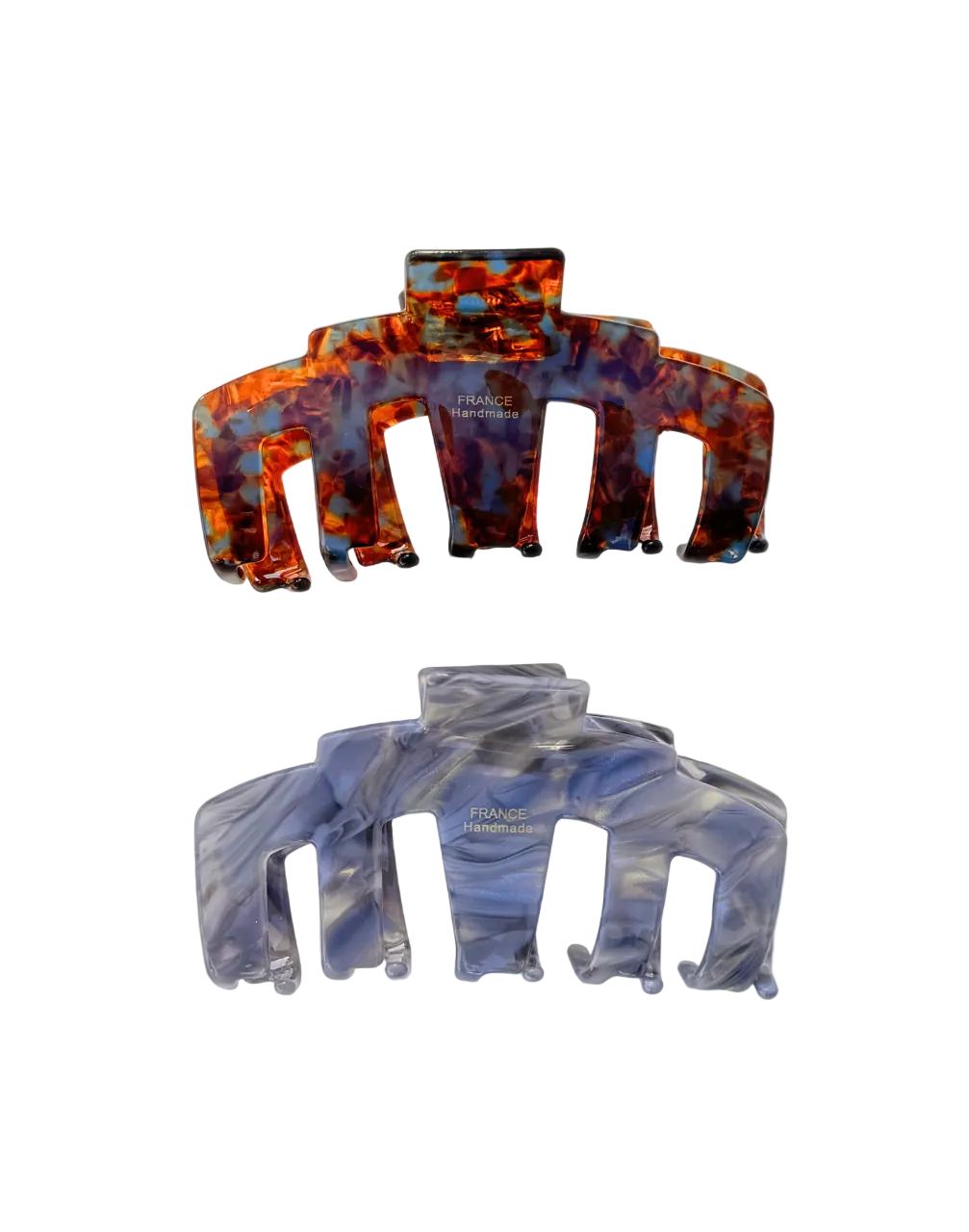 Two hair claw clips, one brown and one light blue, on a white background