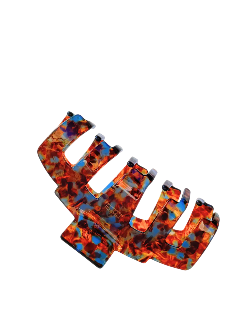 Brown hair claw clip on a white background