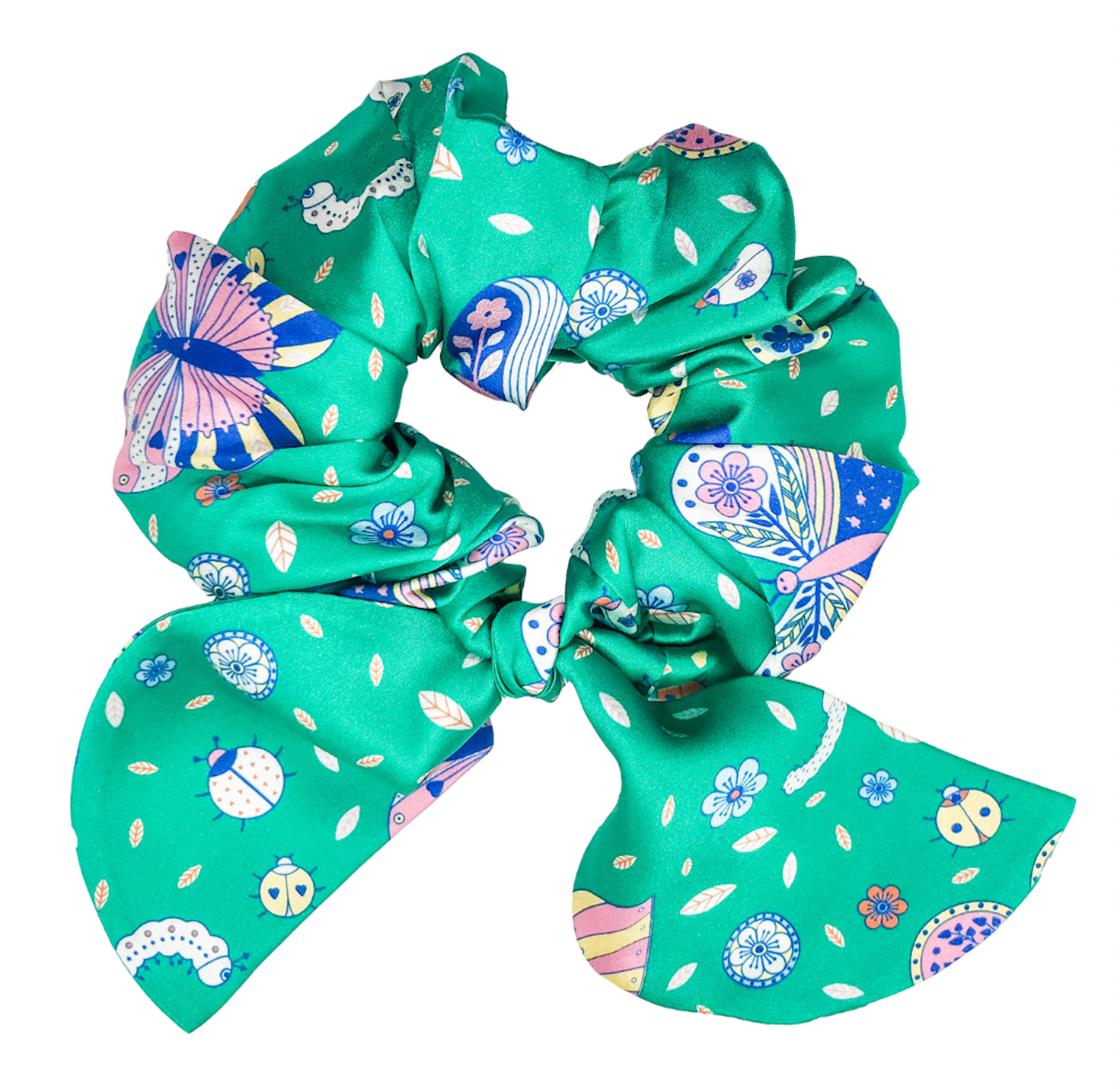 Green scrunchie with floral and butterfly pattern on a white background