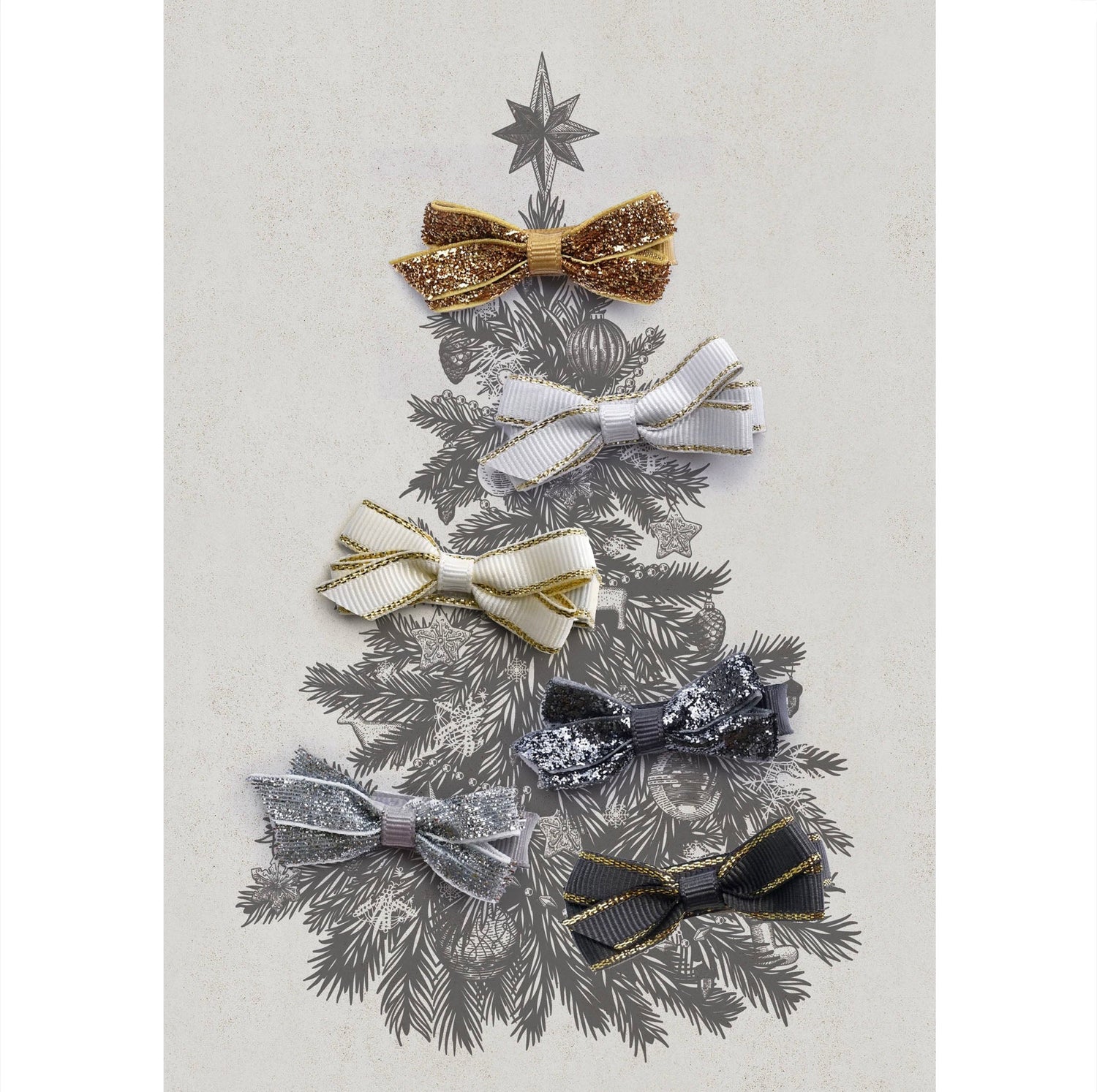 Decorative hair bow set in gold, white, cream, silver and grey, arranged in the shape of a Christmas tree on a textured background.