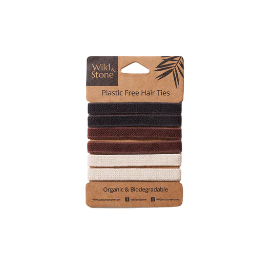 Pack of plastic-free, metal-free, biodegradable hair ties with a Wild & Stone brand label on a white background