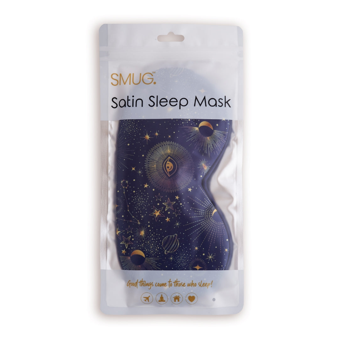 Satin sleep mask packaging with starry night celestial design and 'SMUG' branding.