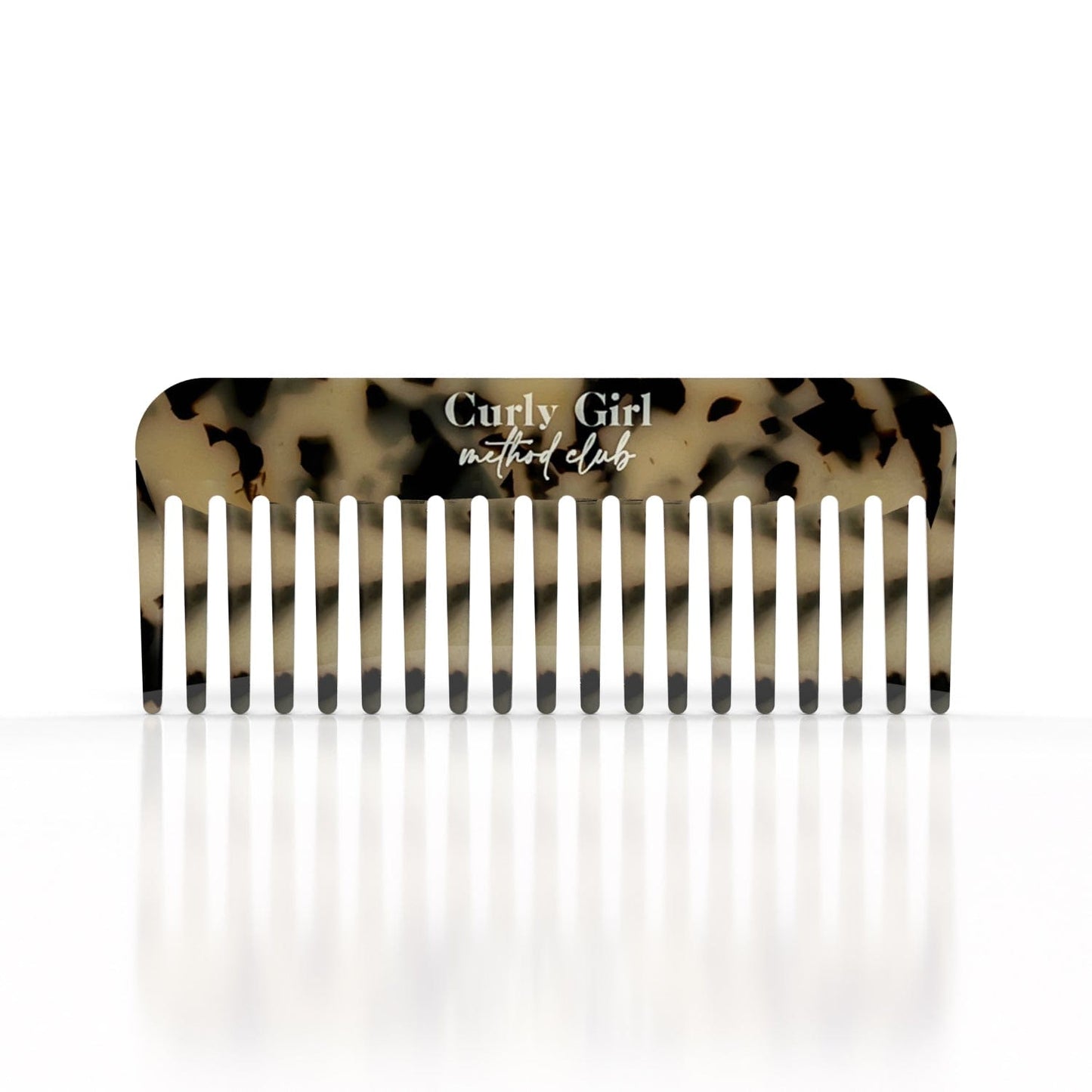 Comb with tortoiseshell pattern and 'Curly Girl Method Club' text on a white background